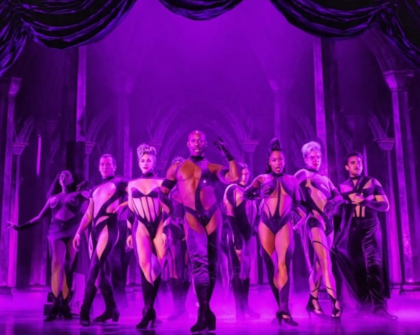 Death Becomes Her Broadway cast on stage in purple costumes