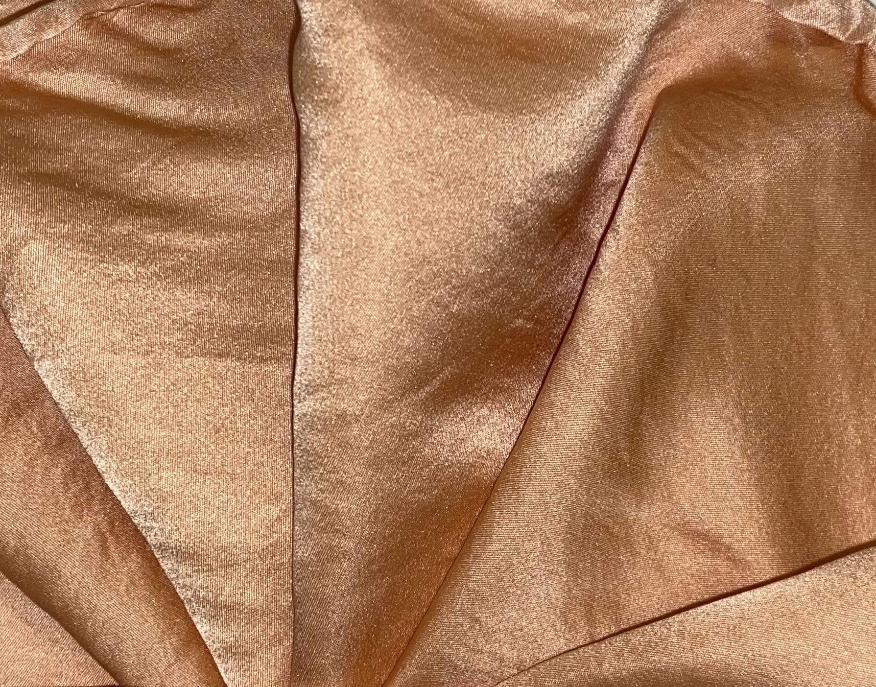 Custom dyed bronze satin fabric construction detail