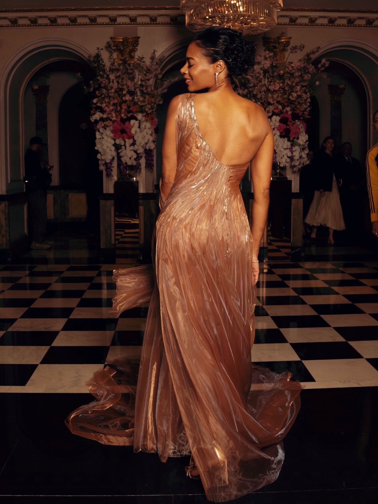 Aisha McShaw back view in gown at Met Gala