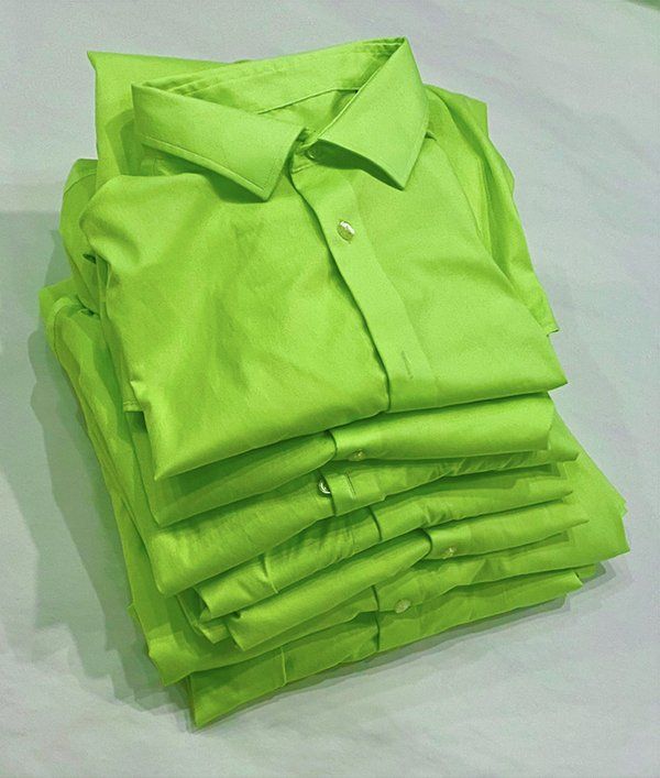 SNL shirts stacked