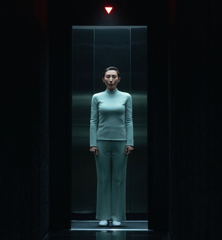 Severance mint turtleneck elevator scene