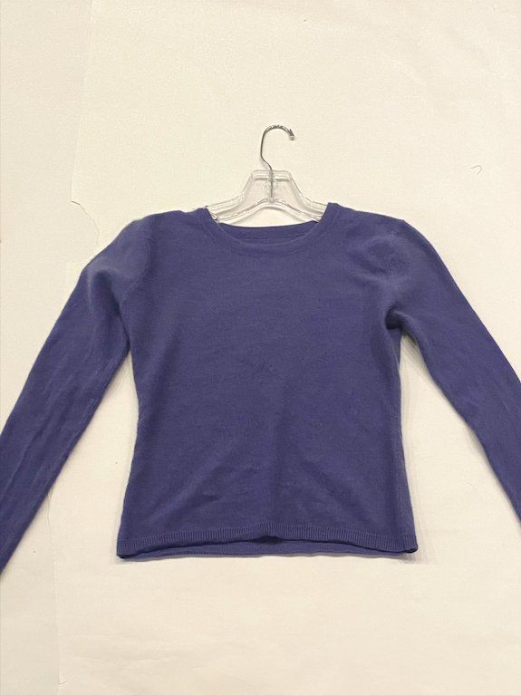 Severance blue sweater on hanger