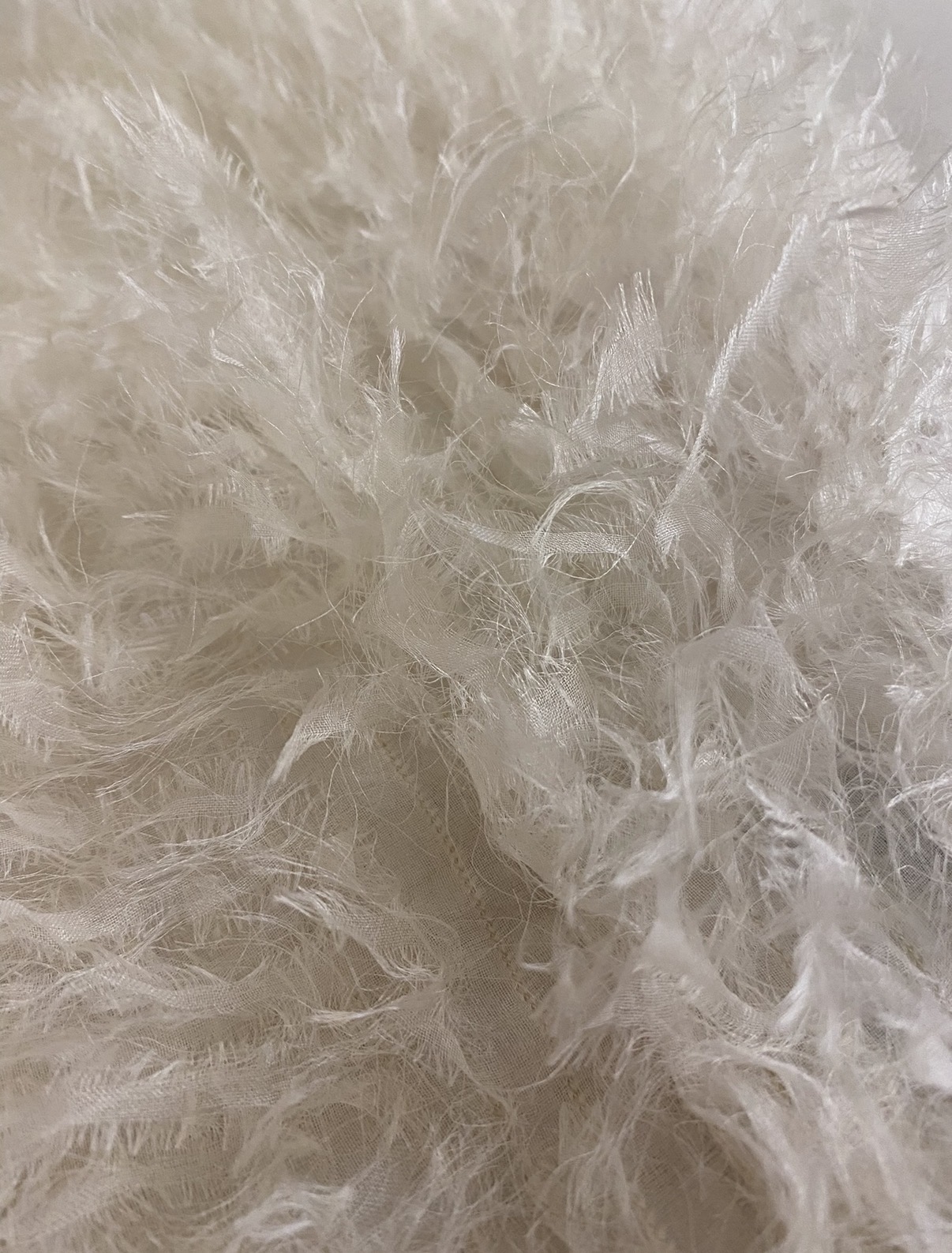 Fabric alternative to feathers and fur